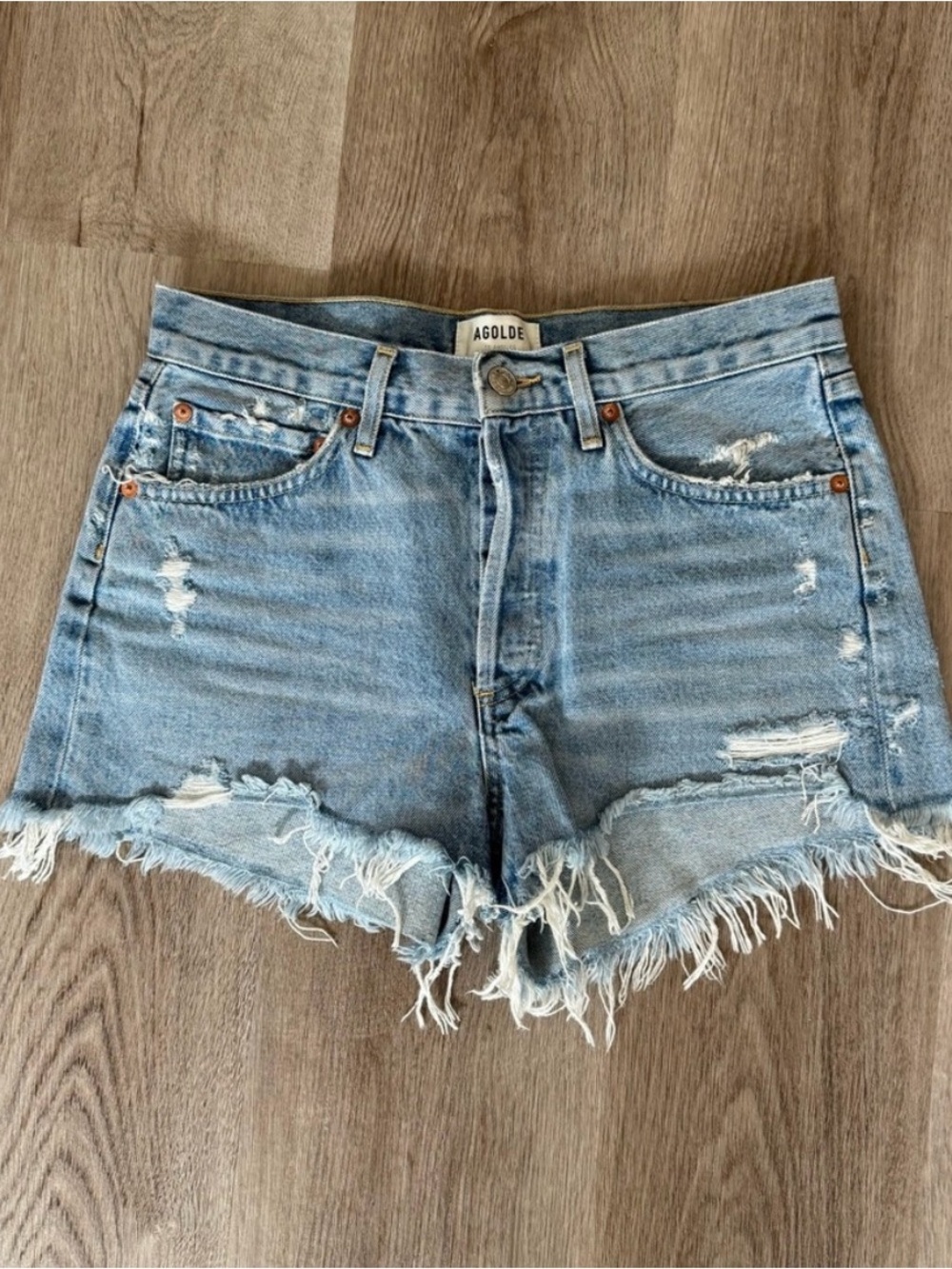 Agolde Washed Light Blue Distressed Cutoff Shorts